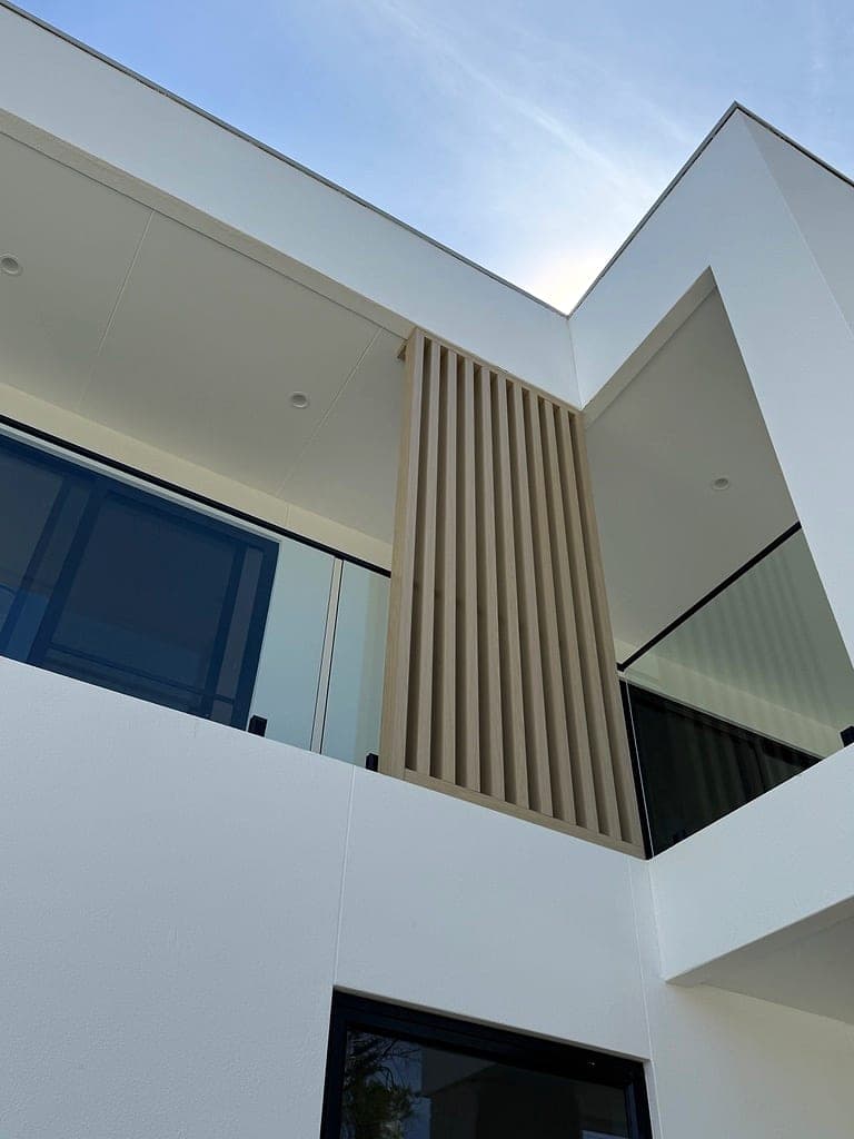 Modern timber-look aluminium batten facade