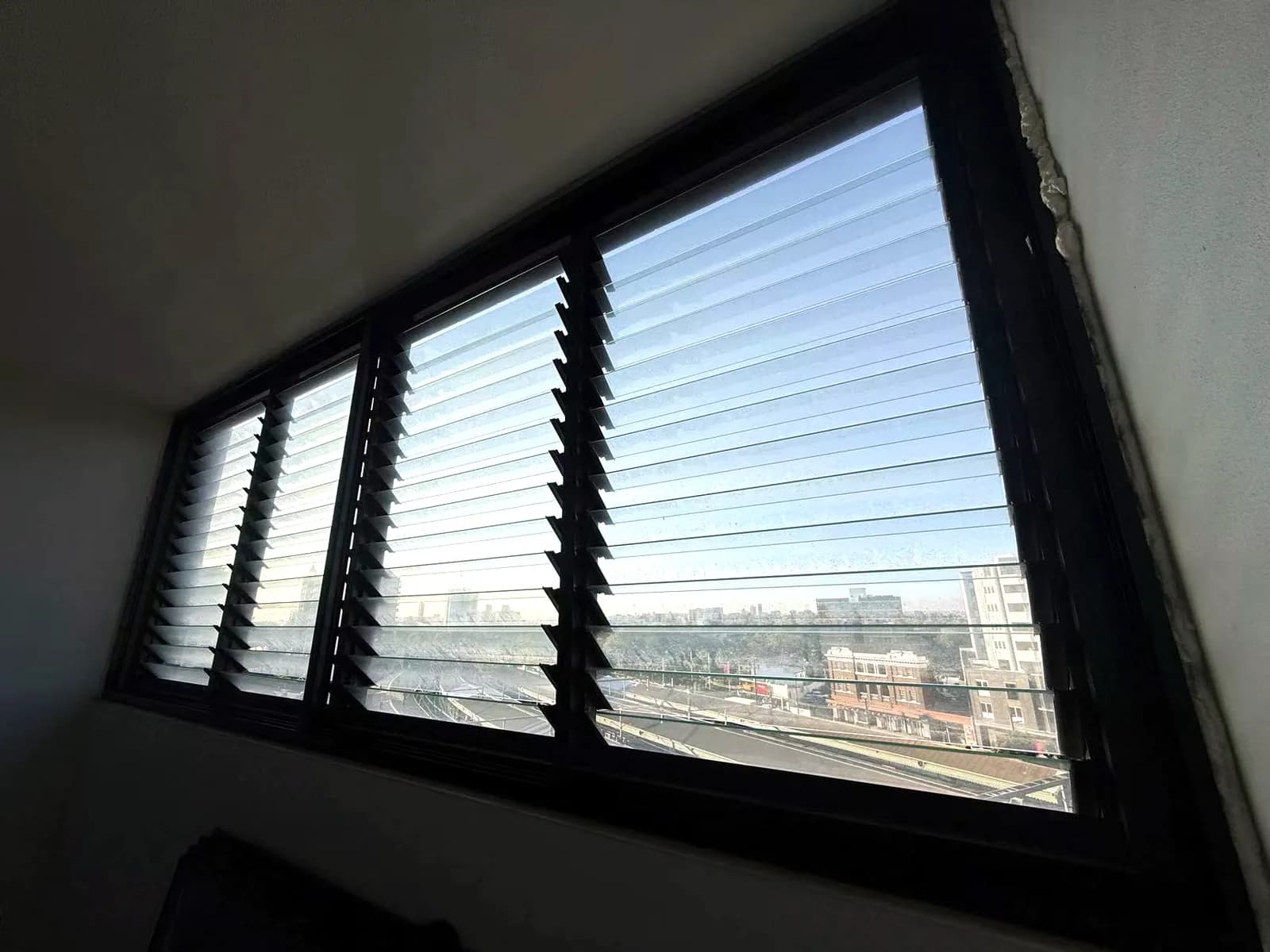 Strathfield apartment window overlooking the railway lines and station