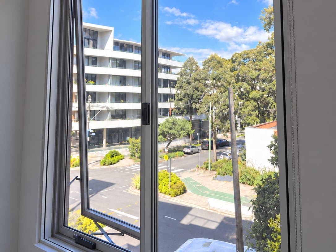 Zetland apartment bedroom with the new internal window, looking out to the street
